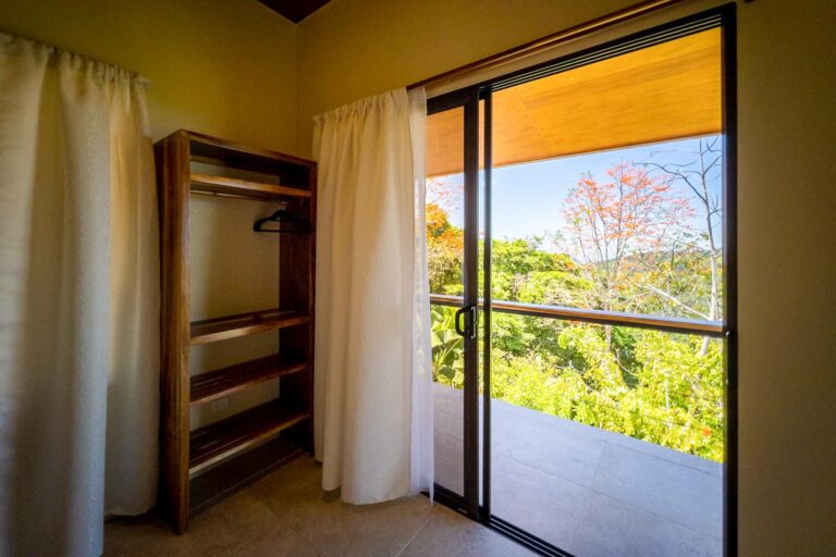 Plumeria bedroom at the Main House Bedrooms at Bella Vida Retreats resort: Bella Vida Retreats (9°14'11.6"N 83°46'09.1”W) 9.2365490, -83.7691880 66PJ+J87 Pérez Zeledón, San José Province, Costa Rica 500m NW of the school, La Florida de Baru, Pérez Zeledón, San José Province, Costa Rica http://www.bellavidaretreats.com Photographed on Friday, March 11, 2022, by Ed Medina.